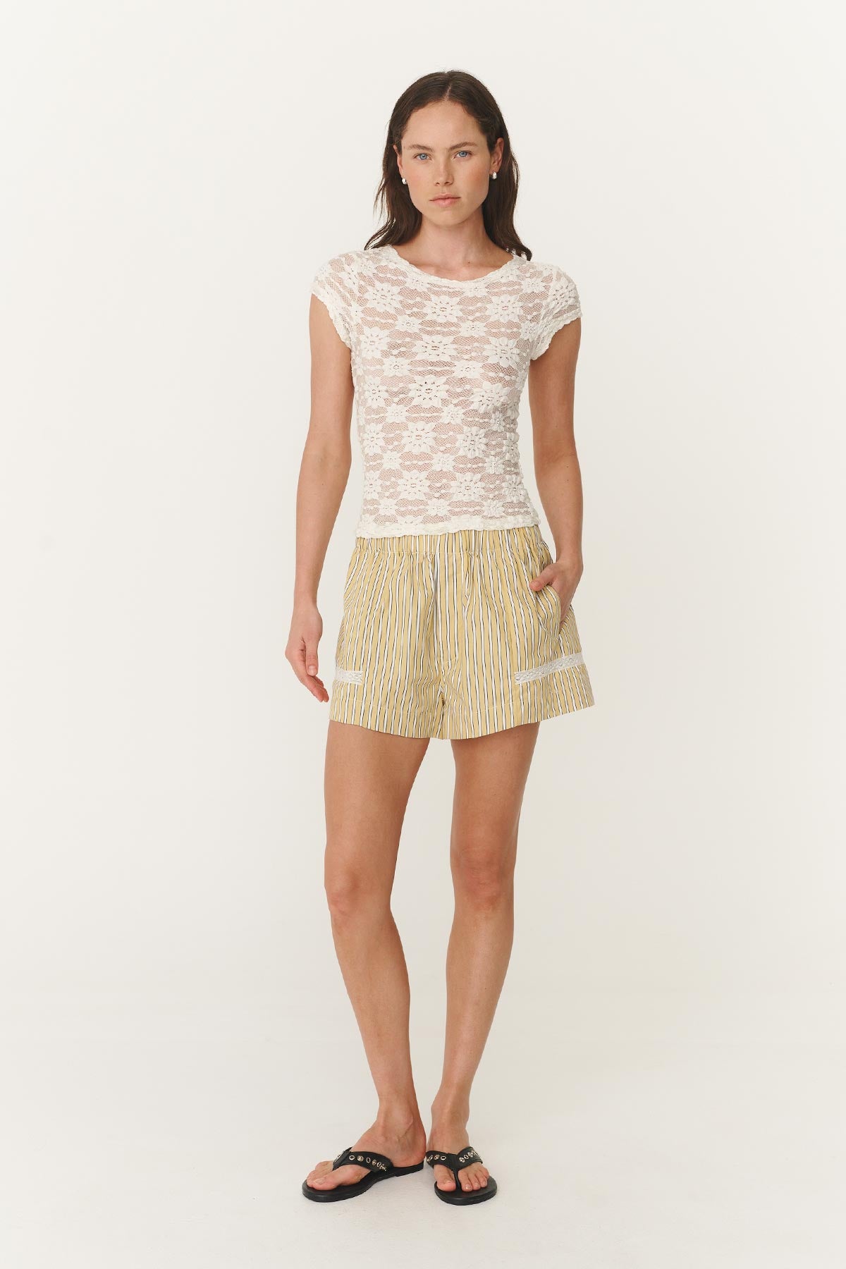 Model wearing a Galo Sunflower Lace Tee in White paired with Rocco Lace Boxer Shorts in a Sunflower Yellow striped print