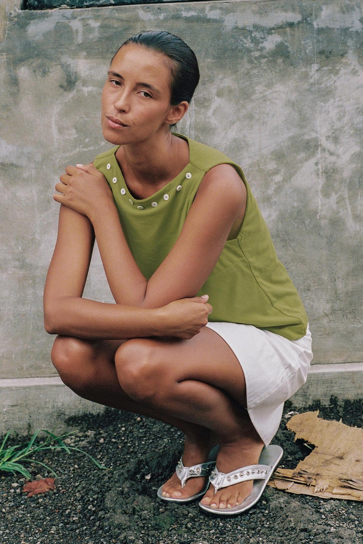 Muriel Button Boatneck Tank Top on green with Shell Button detail and a loose sleeveless fit. Made from 100% organic cotton in Indonesia