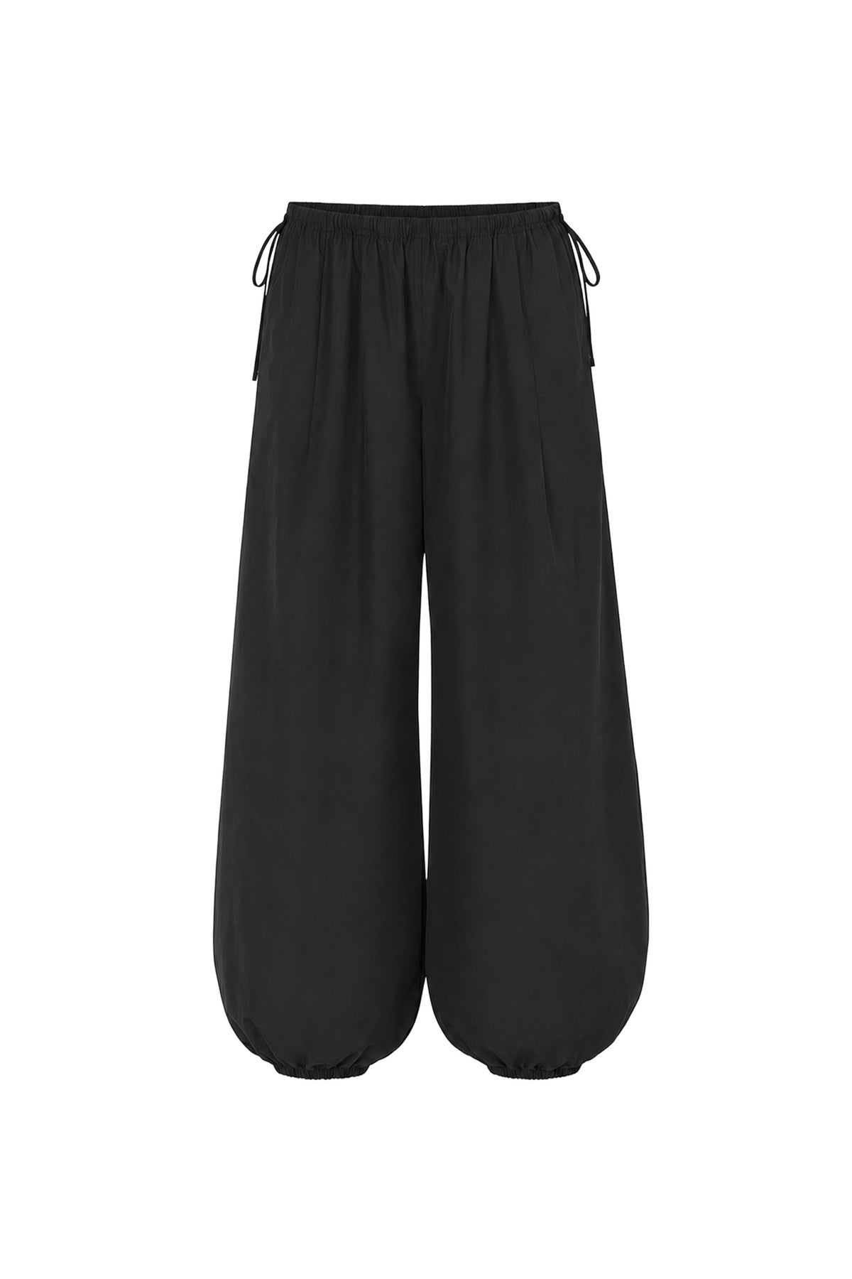 Arc Balloon Pants in Noir – flat lay