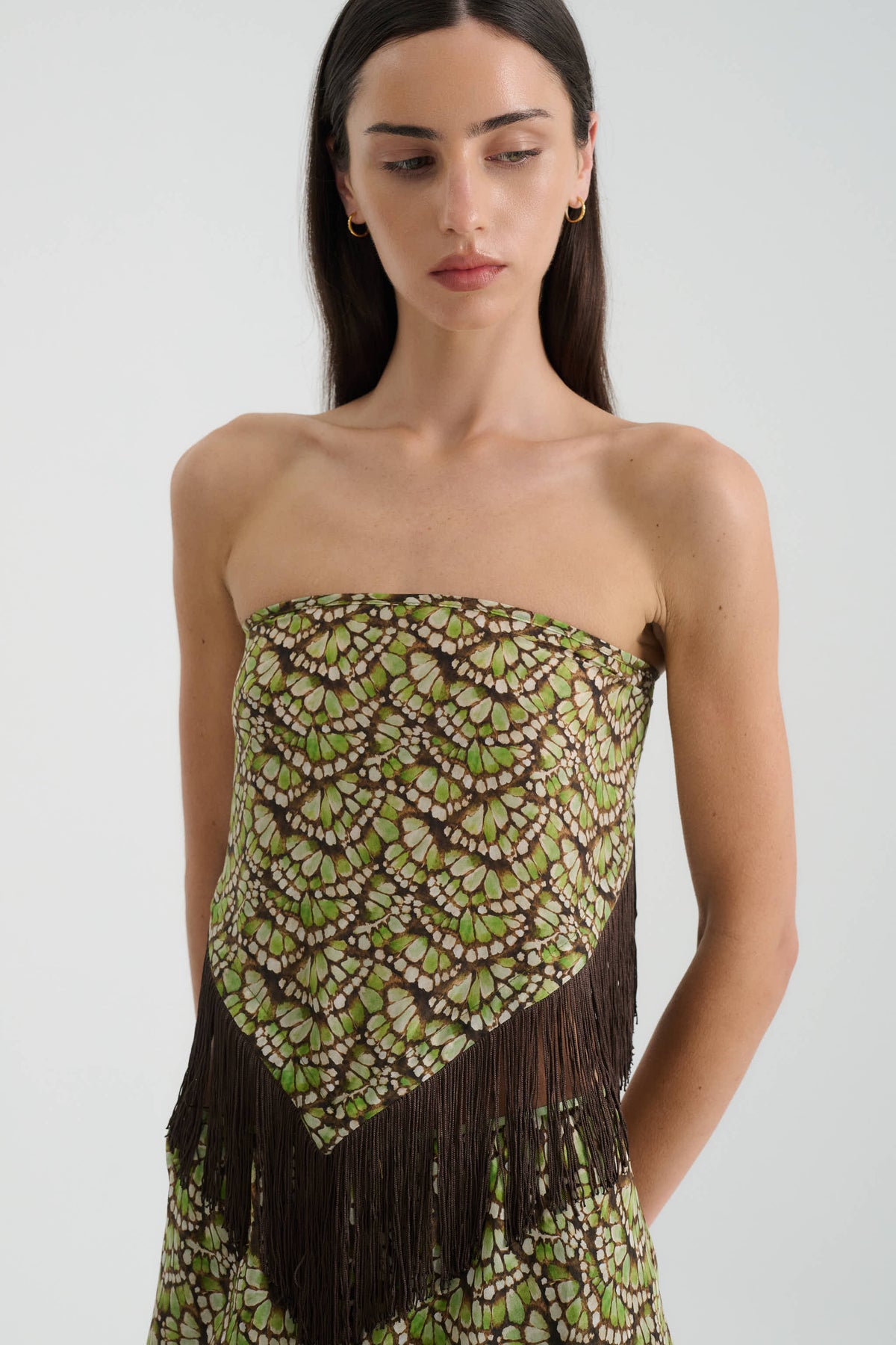 Bobby Silk Tassel Belt in Papillon print – worn as a strapless top, close-up
