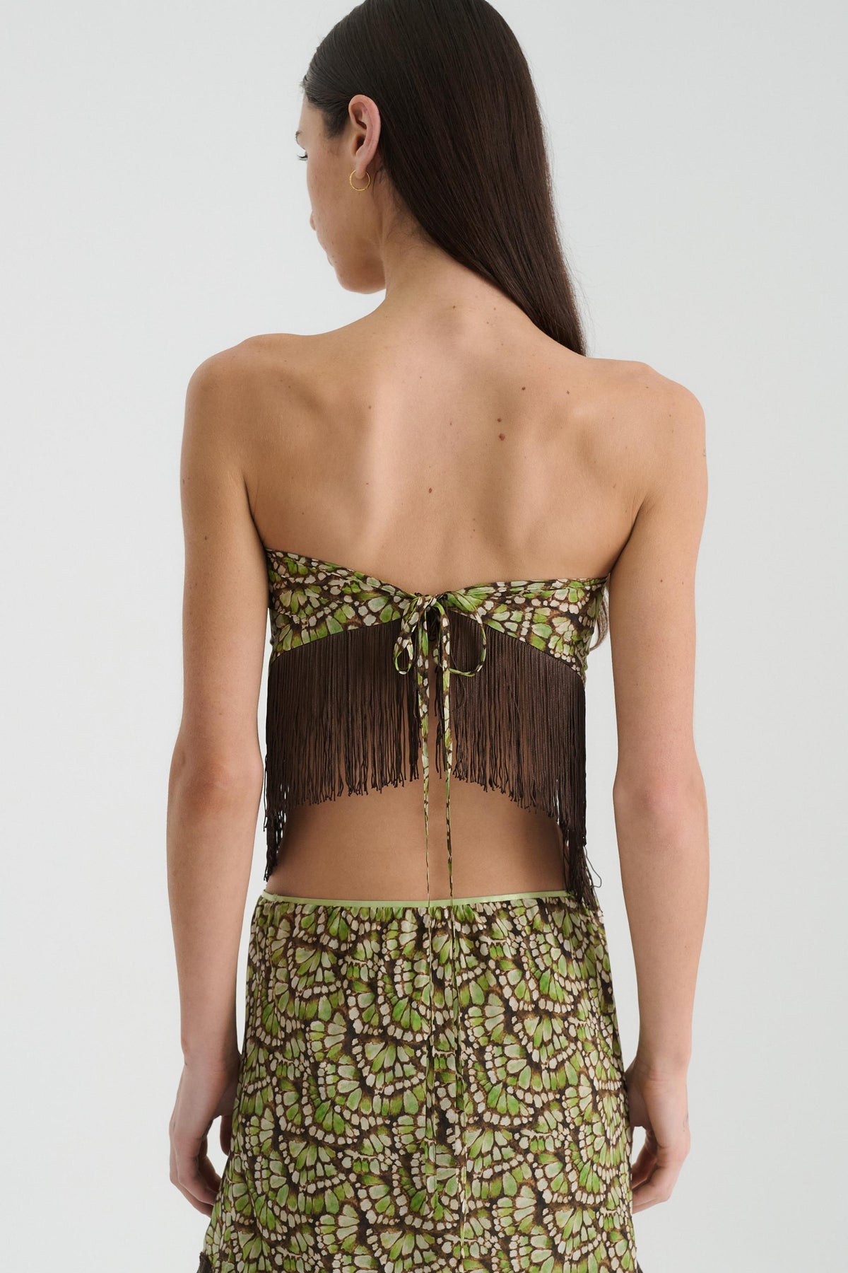 Bobby Silk Tassel Belt in Papillon print – worn as a strapless top, back view