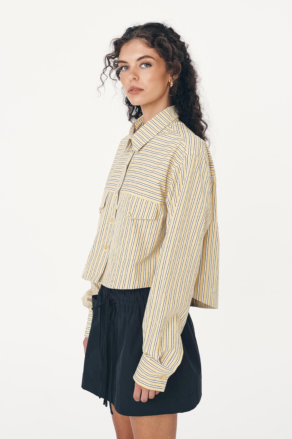 Cole Stripe Crop Shirt with Long Sleeves and paired with a Cargo Mini Skirt in Black 