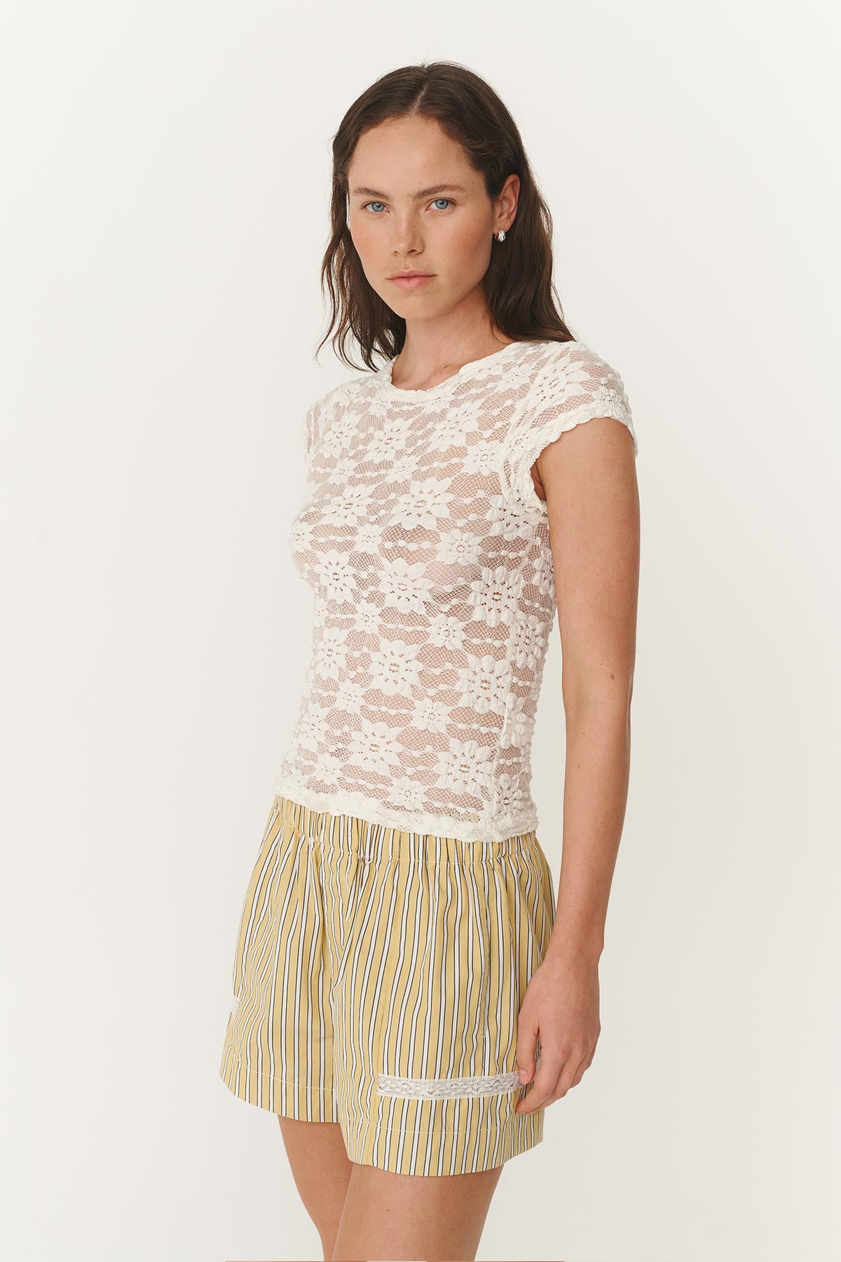 Model wears Sheer White Lace Tee Shirt with Lace Boxers in Yellow Striped print by ROWIE The Label.