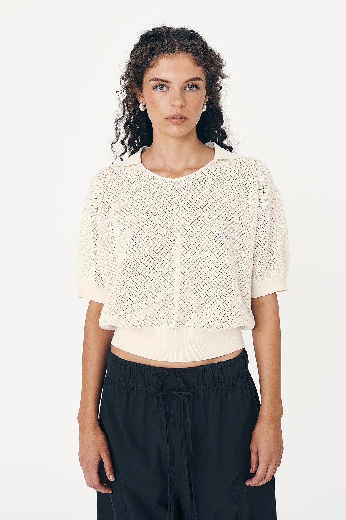 Loretta Pointelle textured knit top paired with ROWIE The Label Jessica Cargo Pants with double tie detail in washed ink black