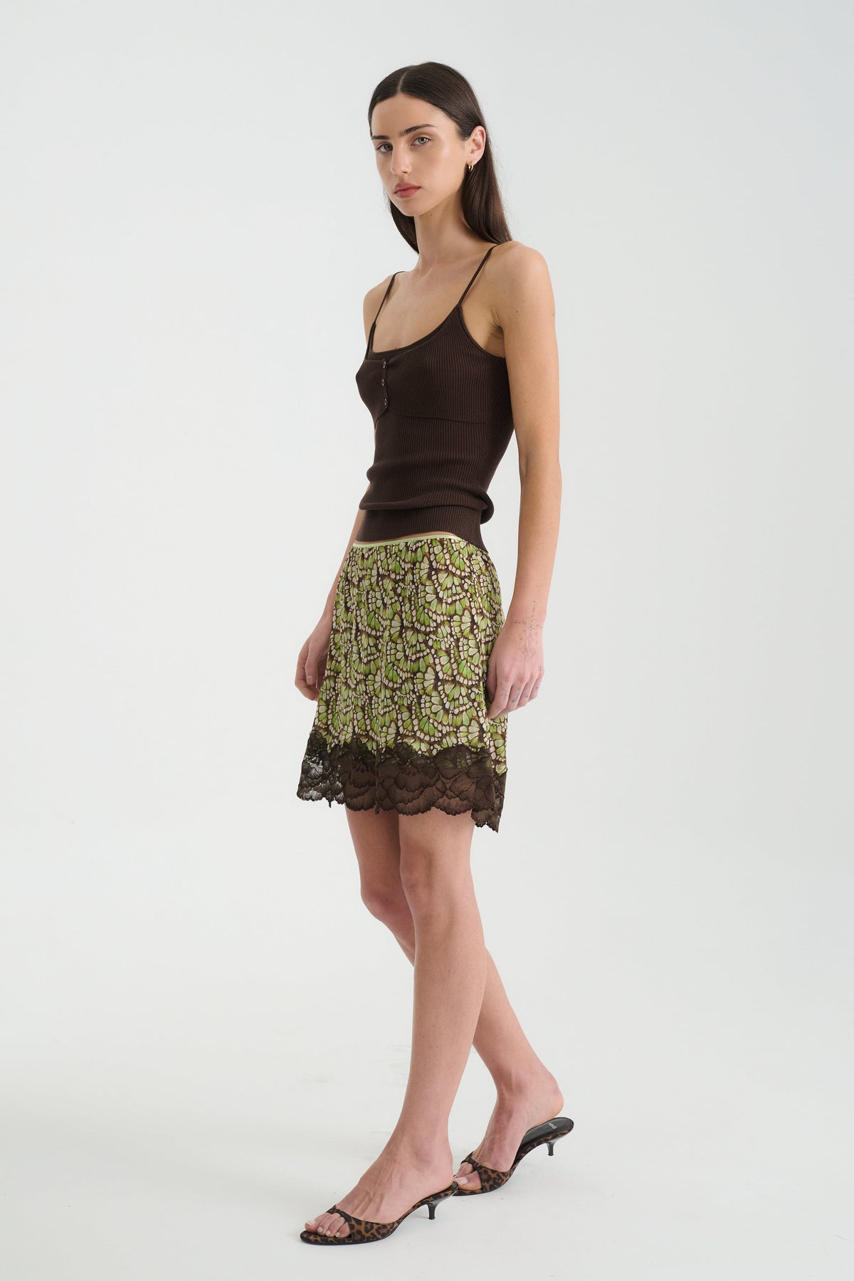 Marina Silk Mini Skirt in Papillon print – side view, walking