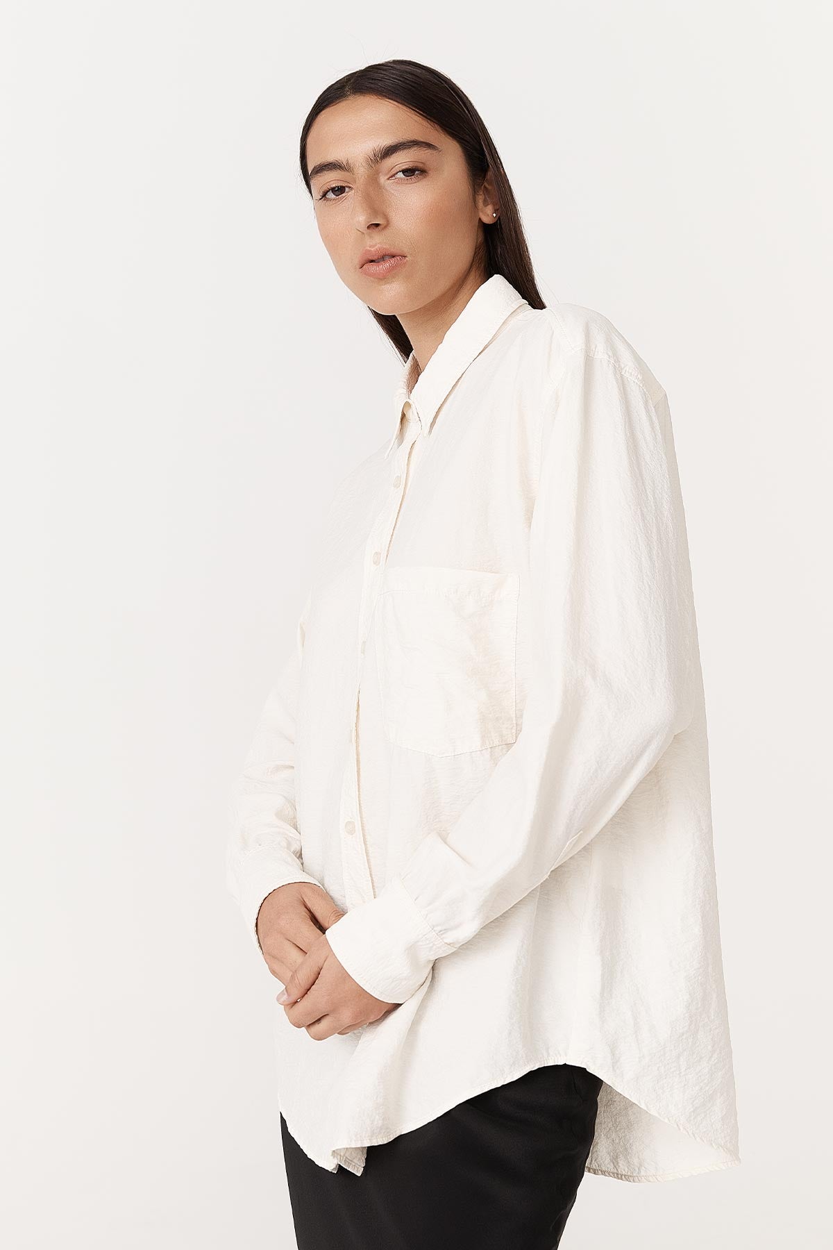 Ramona long-sleeve, silk shirt, paired with the Marina Silk Midi Skirt in black by ROWIE The Label