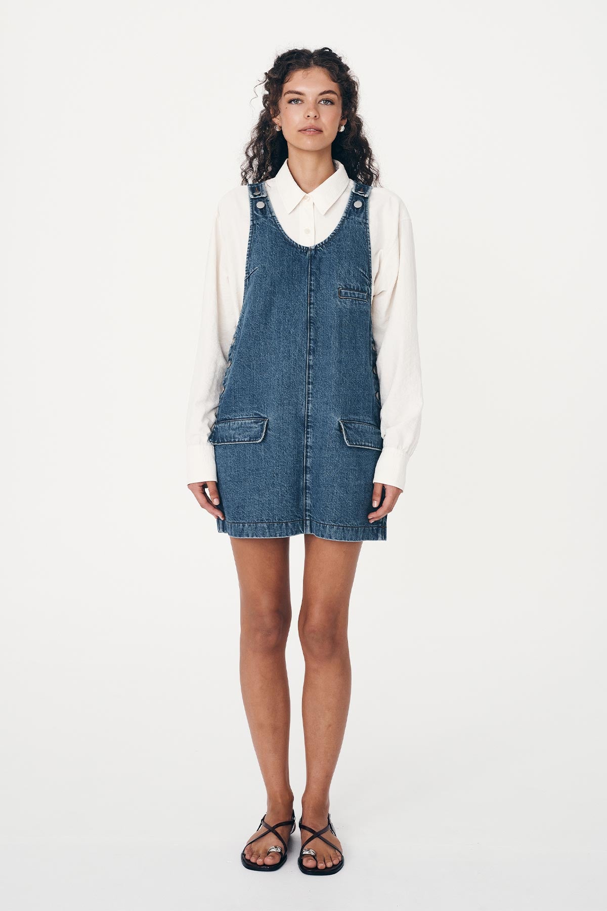 Ramona long-sleeve, silk shirt, underneath  the Franka Denim Mini Dress by ROWIE The Label