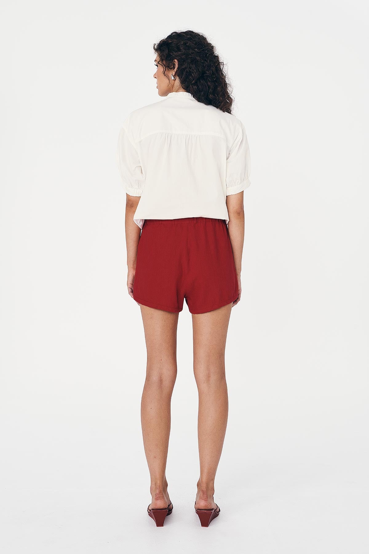 Simone Linen Shorts in Siren Red, paired with Cora White Sprint Blouse